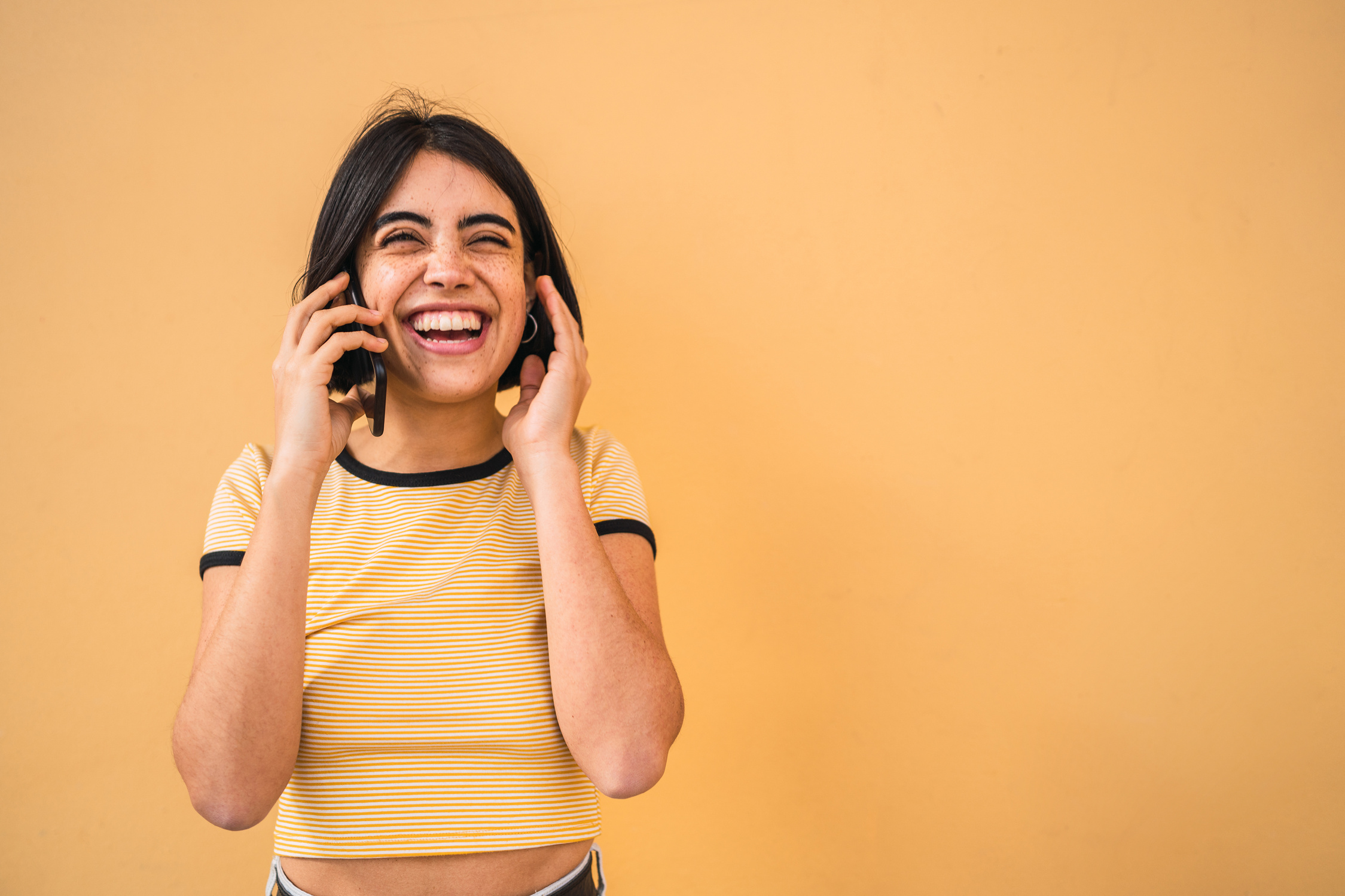 Happy Woman Talking on the Phone     